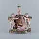 L'Art 
præsenterer: 
Meissen, 
stor antik 
figurgruppe. 
Sjælden figur 
med halvnøgne 
børn og 
vintønde.