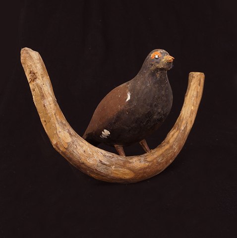 Swedish folkart: A bird, wood. Late 19th Century. 
H: 22cm. W: 35cm