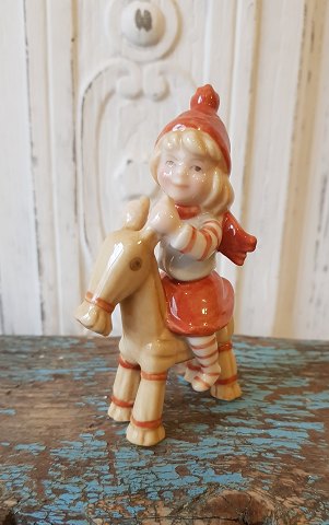 Royal Copenhagen Pixie nisse på buk no. 180