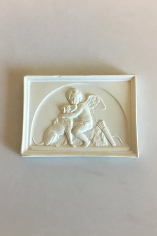 Royal Copenhagen Biscuit Plate Relief "Amor caresses the faithful dog"