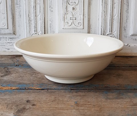 Large cream-colored faience bowl from Copenhagen