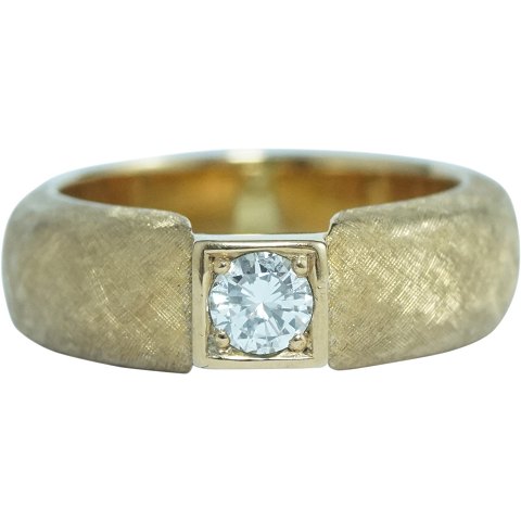 Per E. Lange; A 14k gold ring set with a brillant 0,25 ct. W-VVS
