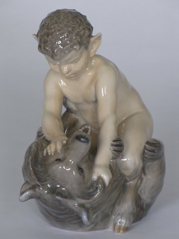 Faun on bear 
Royal Copenhagen
Porcelain