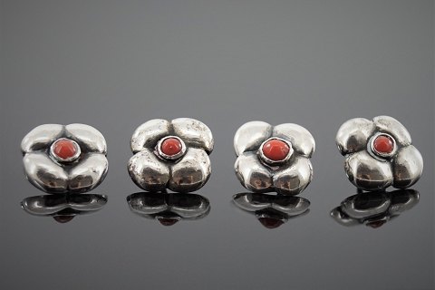 Evald Nielsen; Four  jugend buttons of silver set with corals