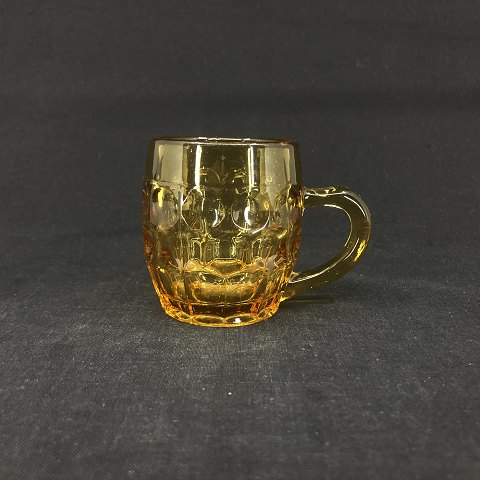Childrens cup in amber glass
