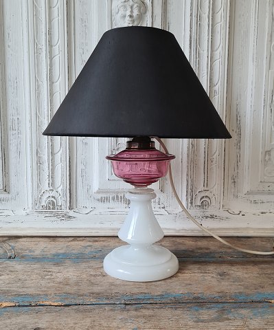 Beautiful 1800s opaline lamp with oil container in pink / raspberry colored 
glass.