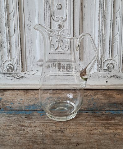 Holmegaard large jug in clear glass 24 cm.