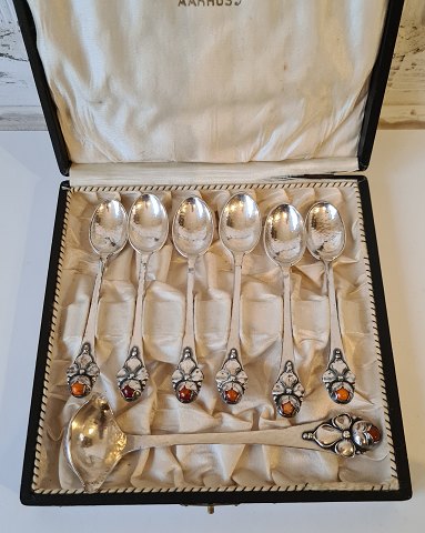 A.Rasmusse set of 6 beautiful coffee spoons and cream spoon in hammered silver 
with amber pearls year 1920