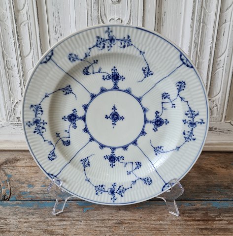 Royal Copenhagen Antique Blue Fluted plate ca year 1800.
Diameter 24 cm. 
Appears with chip.