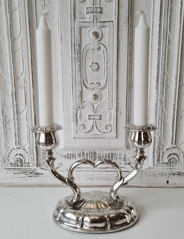 Two-armed silver candlestick, produced in 1929 by Hugo Grün