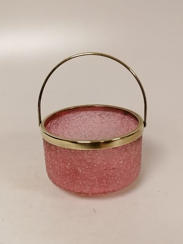 Red sugar bowl of frozen glass with brass mounting