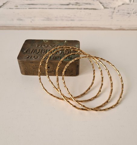 Set of 4 vintage bracelets in 8 kt gold