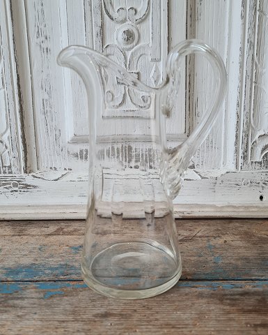 Small milk jug with olive grinds 20 cm.