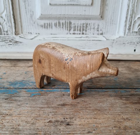 Old prison toys in the form of pig with beautiful patina.