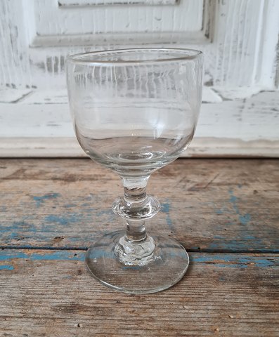 1800s wine glass on stem with button, the basin is painted with very thin white 
enamel decoration in the form of leaf cranes Presumably Mylenberg