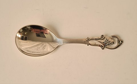 Small serving spoon in silver from 1938 - 13.7 cm.