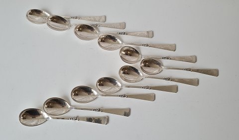 Set on 11 coffee spoons in hammerd silver produced by Heimburger