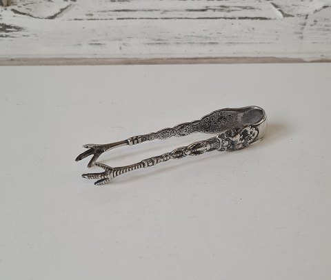 Sugar tongs in silver