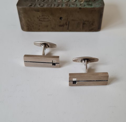N.E.From pair of vintage cufflinks in sterling silver