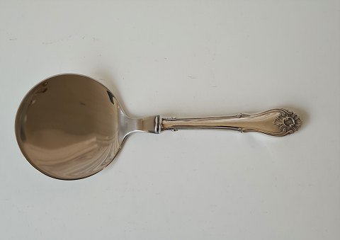 Rococo serving spade in silver and steel