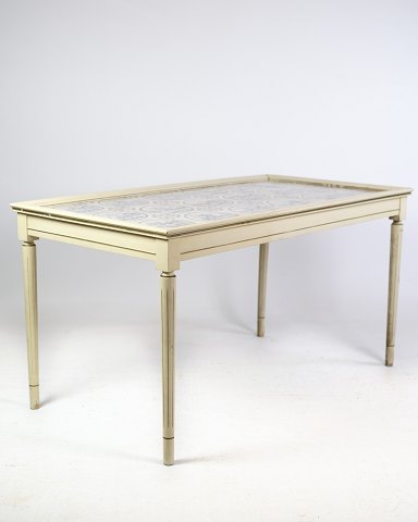 White painted tile table from around the year 1940s.Dimensions in cm: 52.5 W: 98 D: 54Great condition