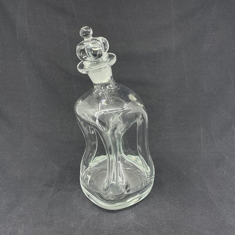 "Tired" clear Cluck Cluck flask from Holmegaard
