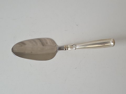 Lotus cake server in silver and steel