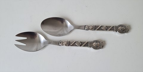 Salad set in silver and steel decorated with baker