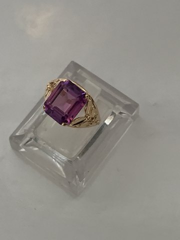 Stylish gold ring with purple stone in it
#18 carat Gold