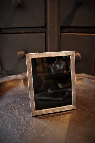 Old photo frame in silver with glass and fine old patina, stamped with silver 
stamp. 14.5x11.5cm...