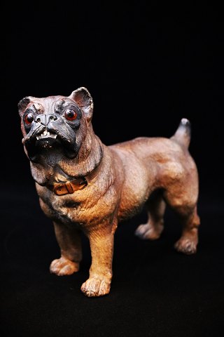 19th century painted terracotta figure of a pug dog with glass eyes 
and fine patina...