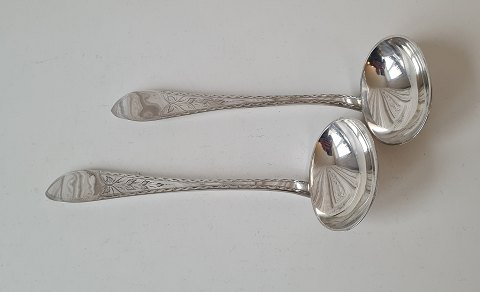 Empire pair of sauce spoons in silver from 1900