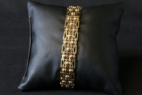 Gold bracelet in 14 carat solid gold, stamped 585 HLL, with case lock.