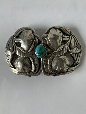 Belt buckle in silver with a turquoise
Stamped 830S
Length 9.8 cm