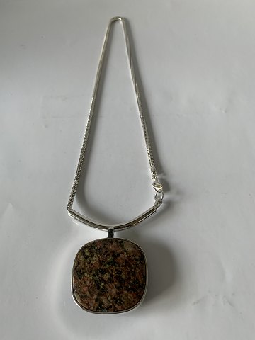 Silver necklace with gneiss stone pendant
The necklace 44.5 cm long
