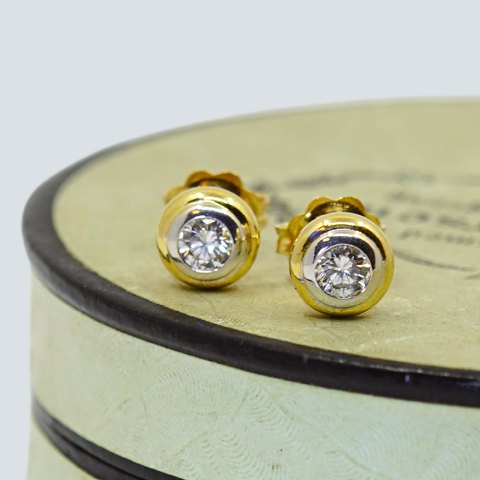 Earrings of 18k gold and white gold set with diamonds