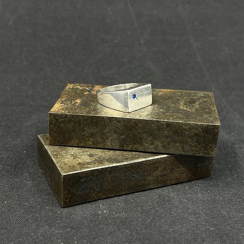 Modern men's ring with blue stone