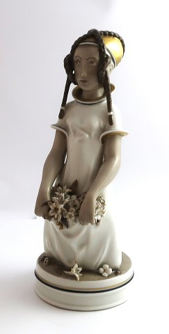 Royal Copenhagen. Porcelænsfigur. Huguenot pige. Model 12461. Højde 20,5 cm (1 
sortering)