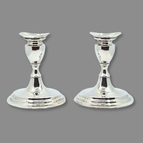 Pair of silver candlesticks