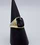 14k guldring m. onyx. Str. 67