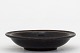 Valdemar Petersen / Bing & Grøndahl
Stoneware dish w. dark glaze
1 pc. in stock
Good condition
Location: KLASSIK Flagship Store - Bredgade 3, 1260 KBH. K.
