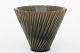 Arno Malinowski / Royal Copenhagen 
Stoneware vase with twisted, tapered corpus with celadon glaze. No. 20,297th
1 pc. in stock
Original condition
