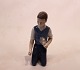 Porcelain figurine, kneeling boy, nr. 2346, by Royal Copenhagen.
5000m2 showroom.