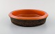 Mari Simmulson for Upsala-Ekeby. Dish in glazed stoneware. Glaze in brown and 
orange shades. 1960