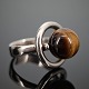 Hans Hansen; A ring made of sterling silver set with a tiger-eye