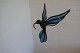A decorative bird to hang up
Made by hand of coloured leaded glass
Bought about 1994 from the Danish glass artist, 
Ivan Boytler, well known for his glasswork/-art
In a very good condition