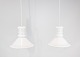 A pair of pendants of white opaline glass by Holmegaard.
5000m2 showroom.
