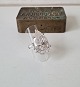 Cocktail ring in sterling silver with large pear cut clear stone flanked by two 
smaller baguette cut clear stones
