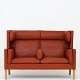 Børge Mogensen / Fredericia Furniture
BM 2192 - 2-seater Coupe sofa in patinated, reddish-brown leather with oak 
legs.
1 pc. in stock
Good, used condition
