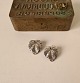 Vintage silver ear clips in the shape of leaves